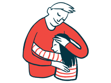 A man and a child hug and comfort one another.