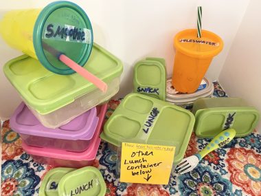 Labels \ Angelman Syndrome News \ A stack of food containers with tape labels.