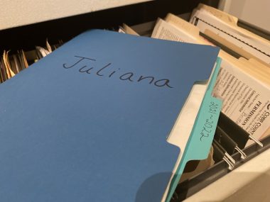 school \ Angelman Syndrome News \ A blue file folder marked "Juliana." 