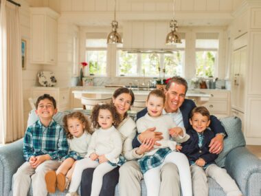 A family photo with two parents and five children, ranging in age from 4 to 10.